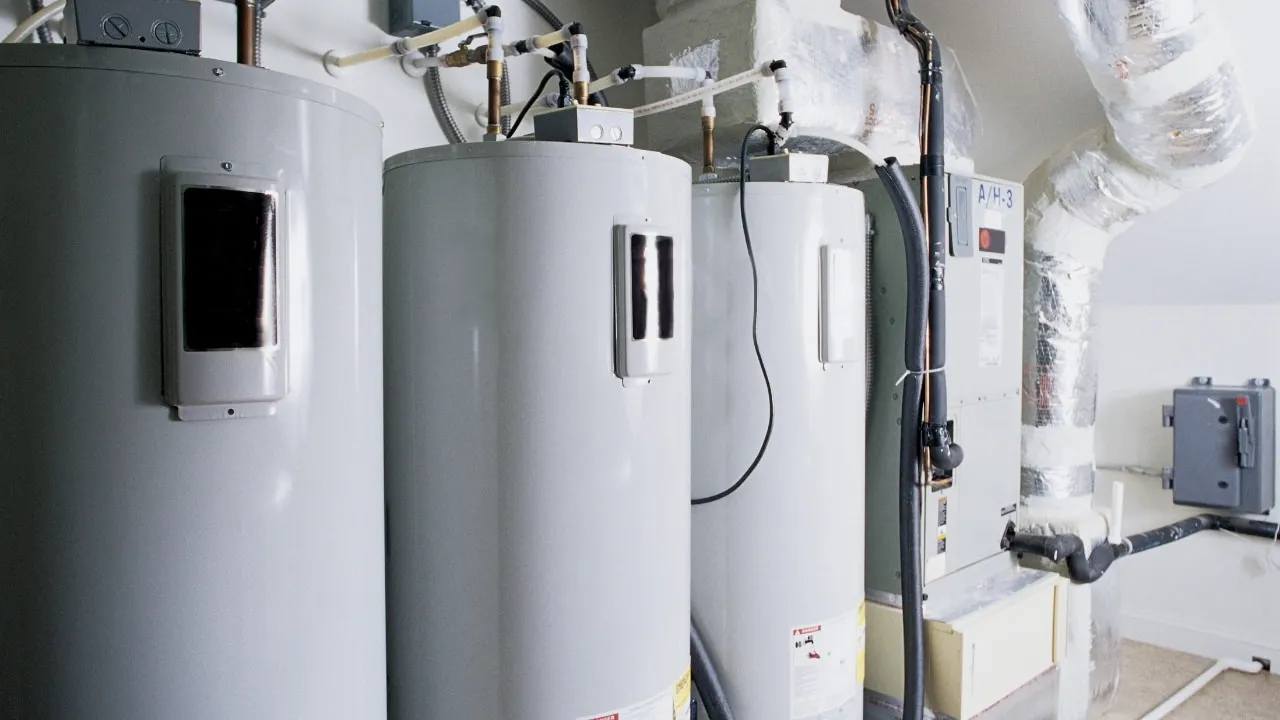 Commercial water heater installation in a mechanical room