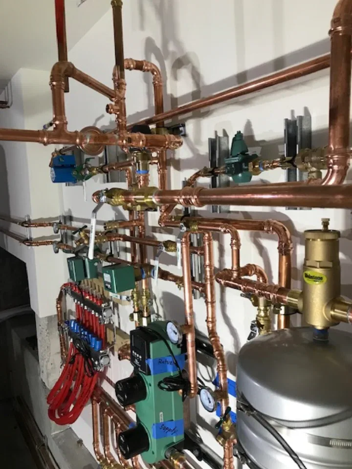 Complex copper pipe network and valve assembly — hydronic water heater system